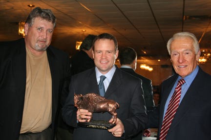 Steve Tasker Receiving an Award from Kent Hull and Marv Levy